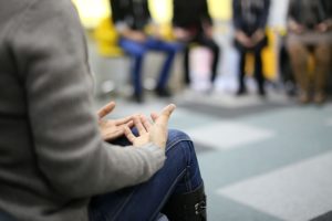 group therapy people talking